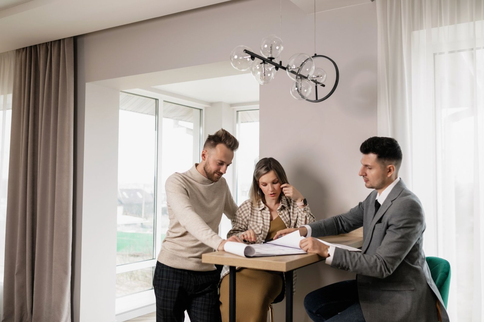 Homeowners reviewing options with an advisor